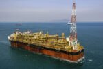 View of FPSO oil rig, floating production, storage and offloading vessel used to explore the crude oil & gas under the seabed.