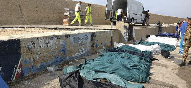 Тела десятков нелегалов, погибших у берегов Италии, складируют в ангаре аэропорта