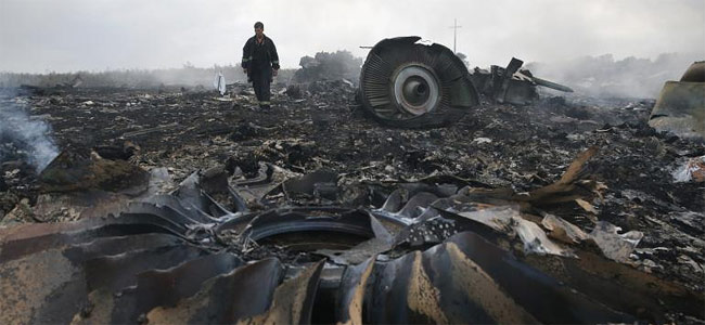 Малайзийские жертвы со сбитого в Украине лайнера MH17 возвращаются домой